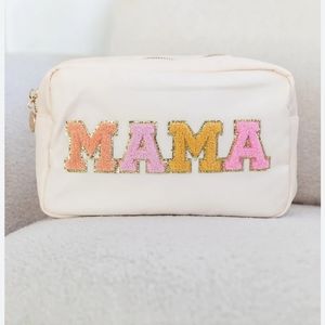 NWOT pink lily mama pouch